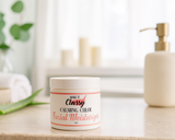 Jar of 'Make It Classy Calming Chloe' facial moisturizer on a bathroom counter with a blurred background